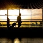 person walking through an airport